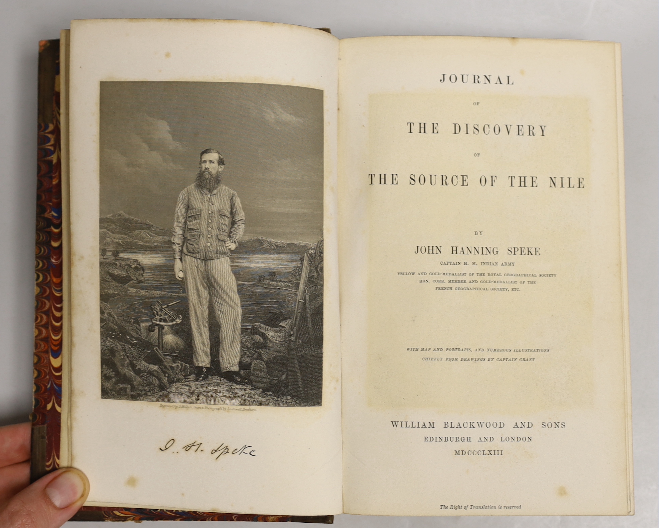 Speke, John Hanning - Journal of the Discoveries of the Source of the Nile. 2 photograv. portraits, 2 maps (1 folded, 1 coloured), 24 plates; old half calf and marbled boards, gilt panelled spine with maroon label, marbl